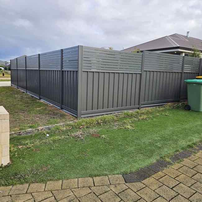 Colorbond and aluminium slat combo fence